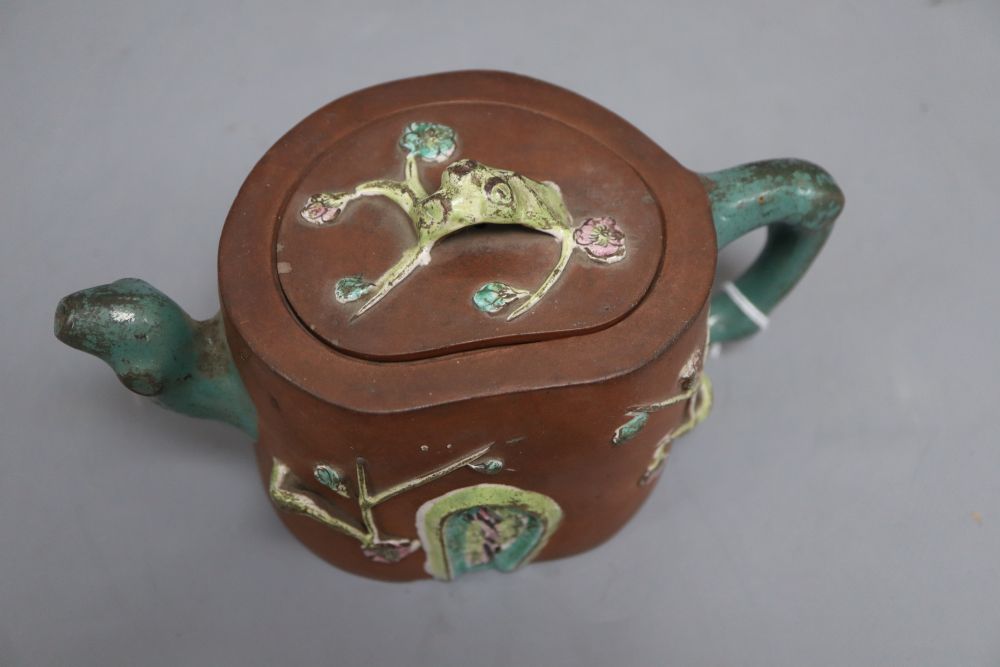 A 19th century Chinese Yixing enamelled teapot and cover, height 11cm